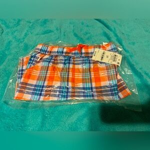 NWT and in plastic Macy’s plaid shirts